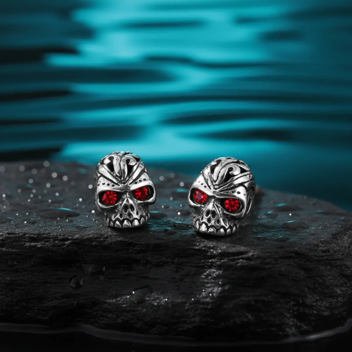 Carved Red Eye Skull Stud Earrings | Xenos Jewelry