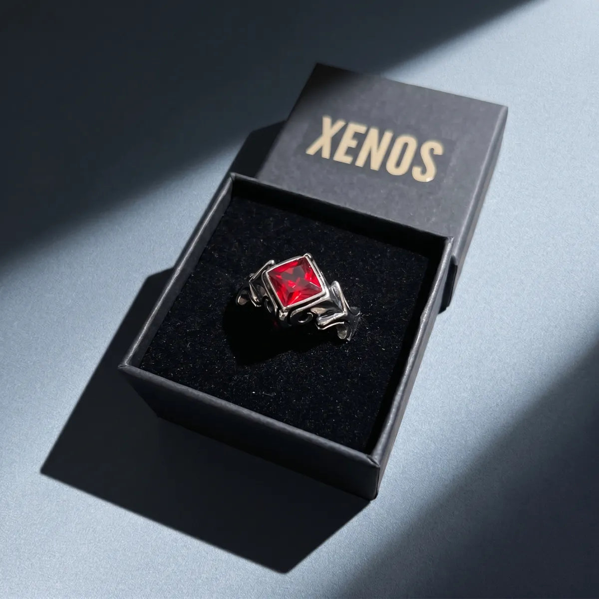 Gothic Princess Cut Red Crystal Ring Inside a Xenos Jewelry Box