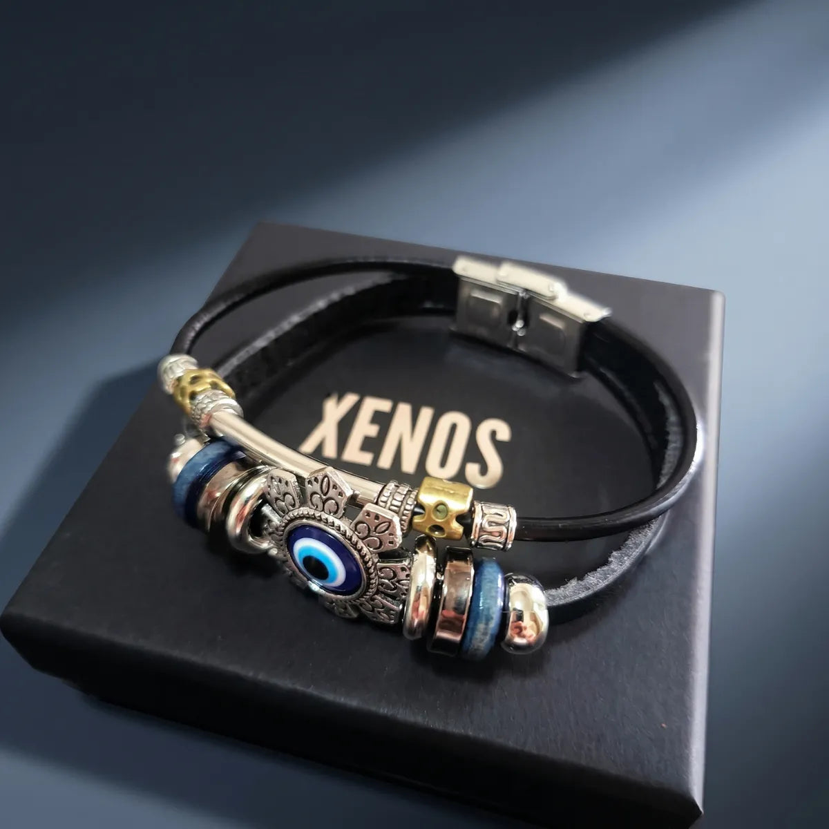 Handcrafted Leather Evil Eye Bracelet inside a Xenos Jewelry box