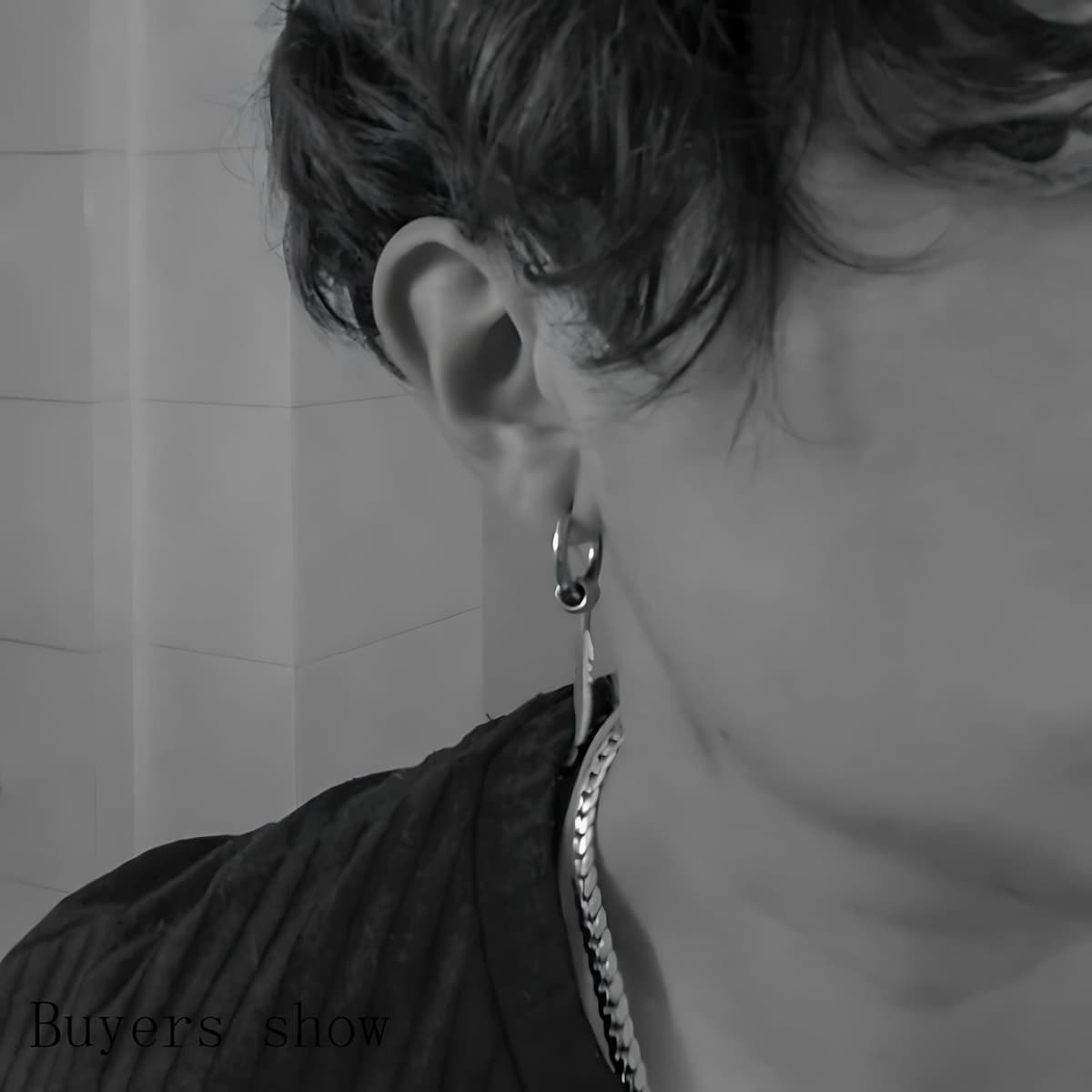 Stainless Steel Feather Earrings Worn by Male Model Xenos Jewelry