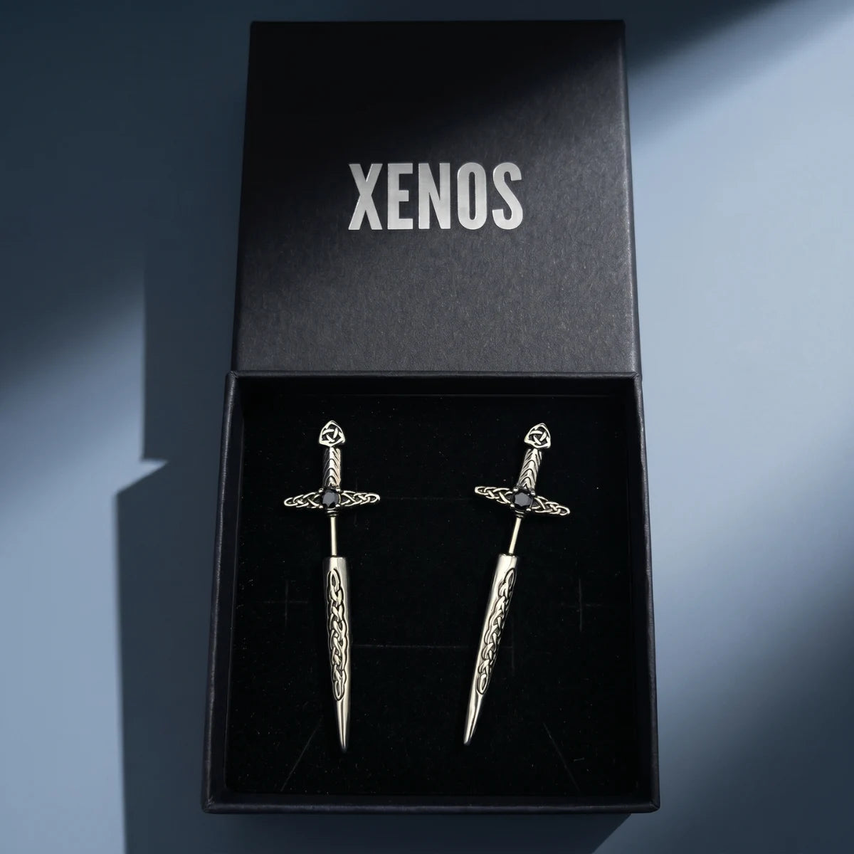 Sword Earrings Through Ear Style A Inside a Xenos Jewelry Box