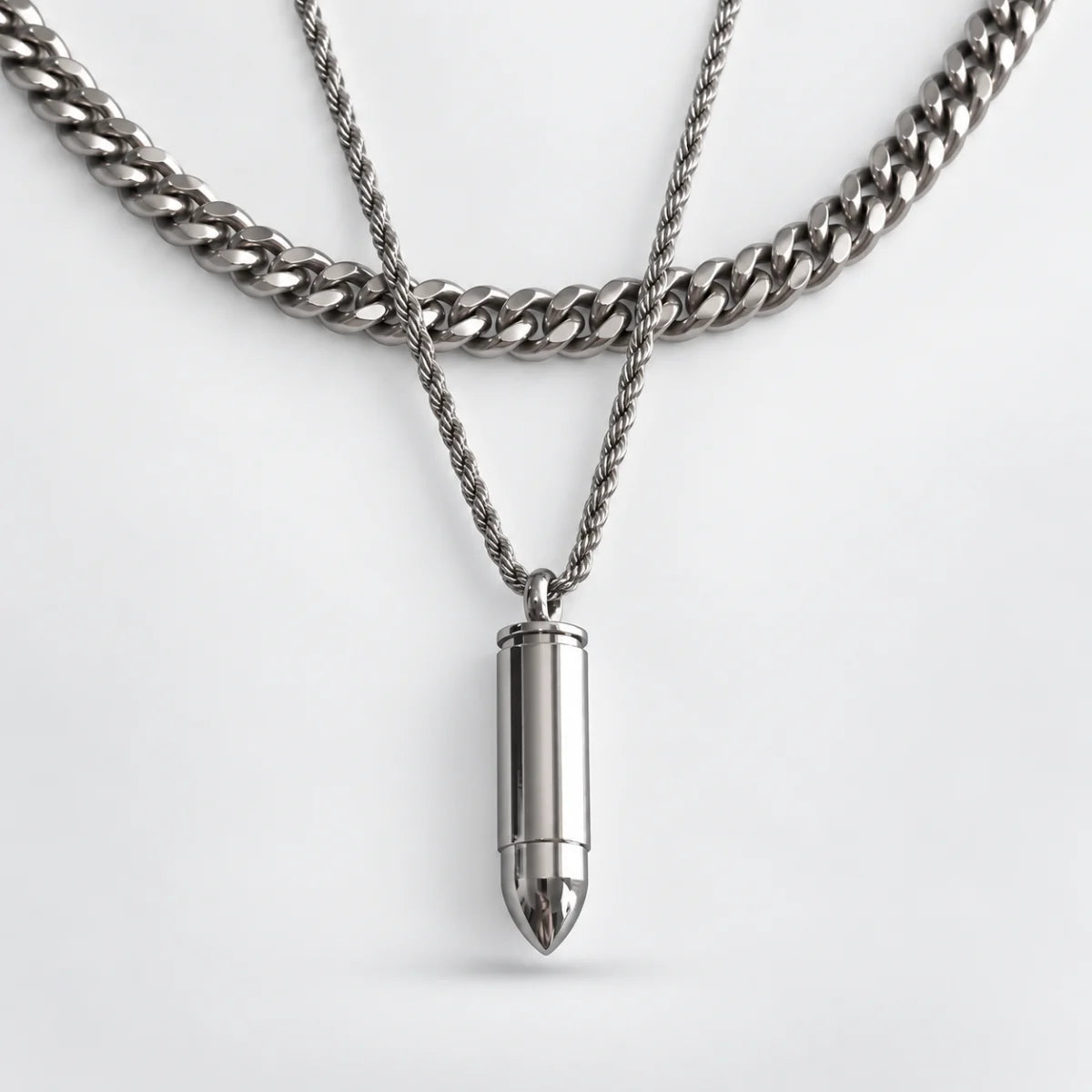 bullet capsule necklace layered set white background