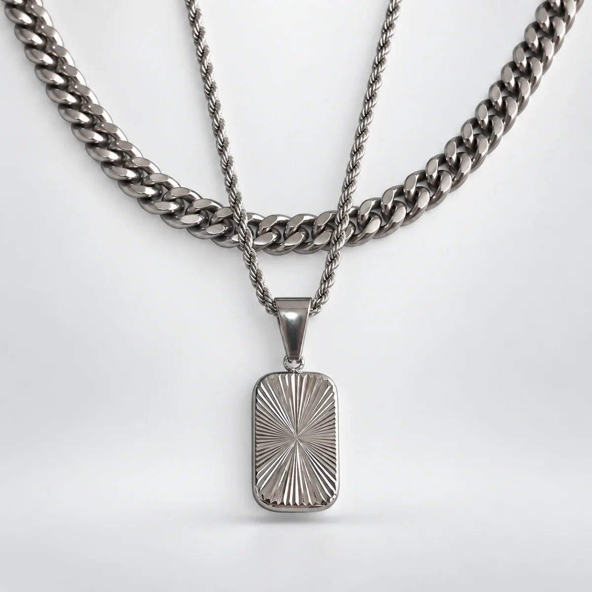 sunburst dog tag necklace layered set white background