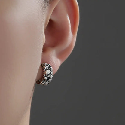 6mm Silver Skull Cluster Huggie Hoop Earrings Worn by Male Model Close Up