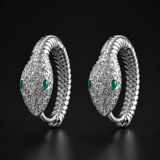925 Silver Emerald Eye Snake Hoop Earrings Pair Close Up Black Background
