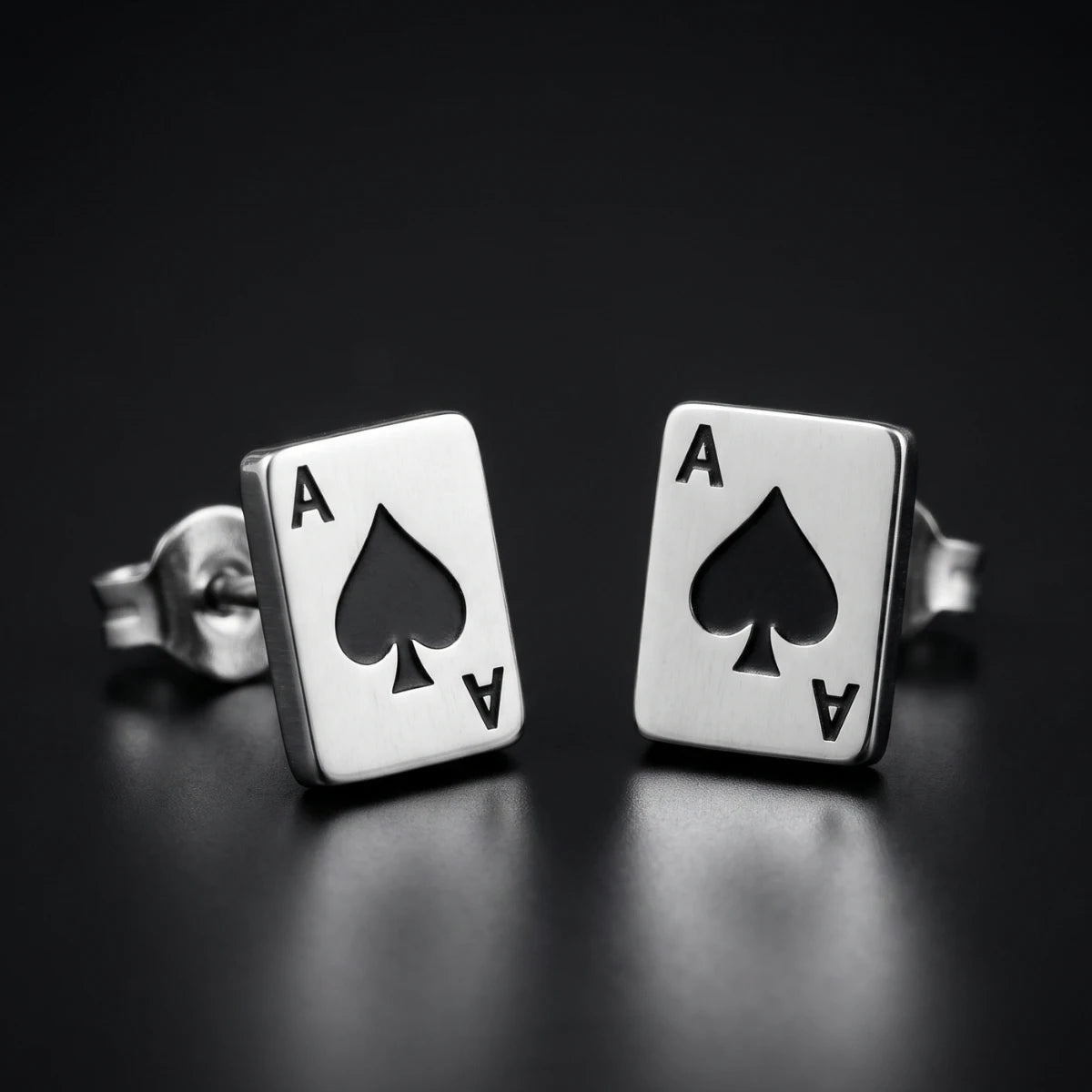 Ace Earrings Silver Pair Close Up Black Background