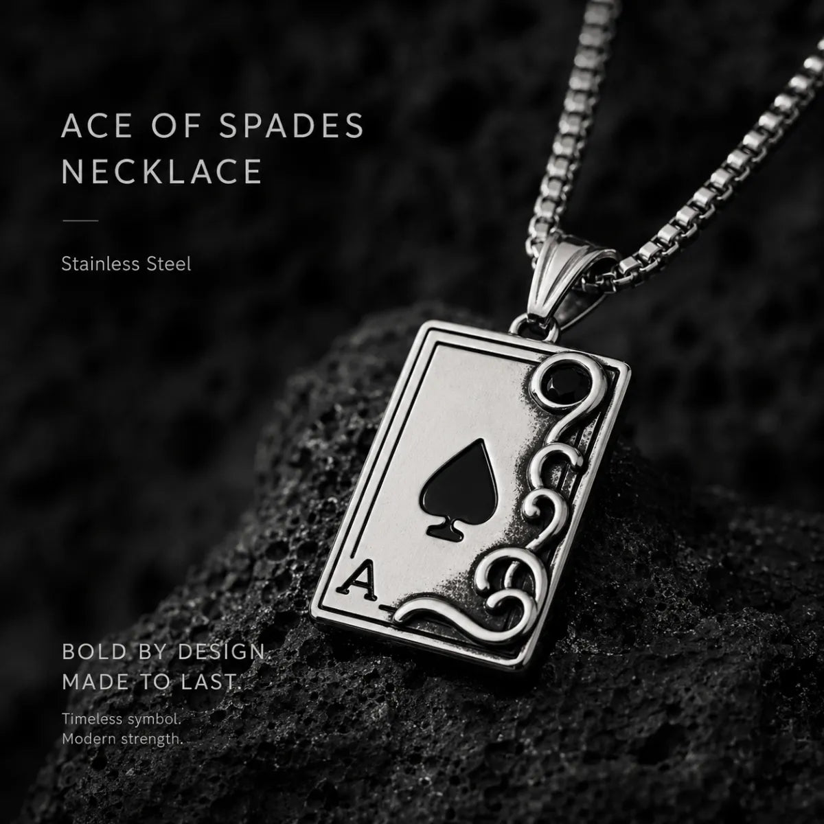 Ace of Spades Necklace Silver Displayed on Stone Surface