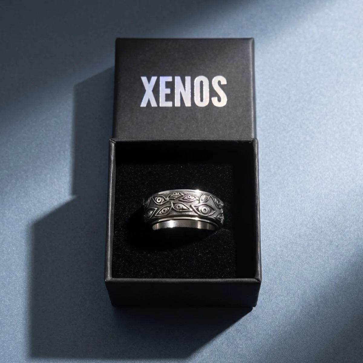 All Seeing Eye Spinner Ring Silver Inside a Xenos Jewelry Box