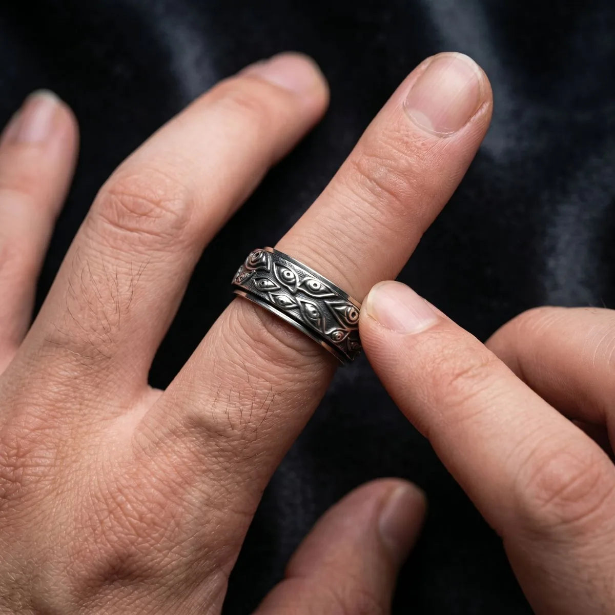 All Seeing Eye Spinner Ring Silver Worn by Male Model Close Up