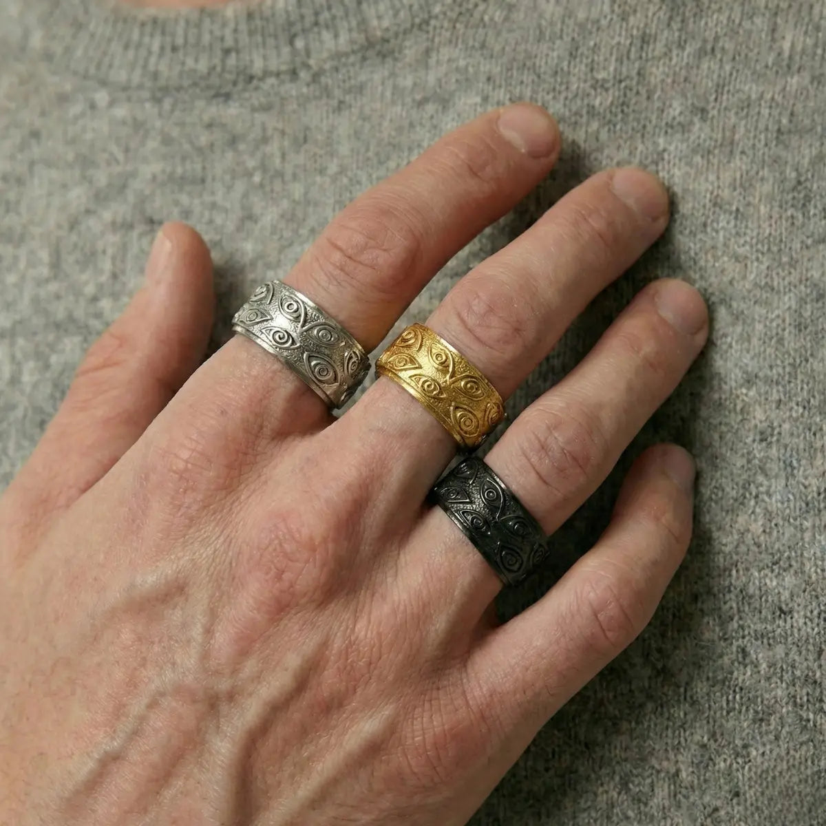 All Seeing Eye Spinner Rings Worn by Male Model Close Up