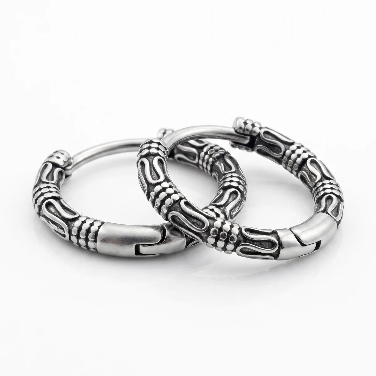 Bali Hoop Earrings Silver Close Up Lying Down