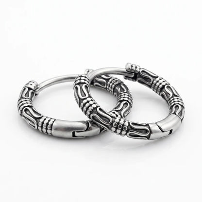 Bali Hoop Earrings Silver Close Up Lying Down