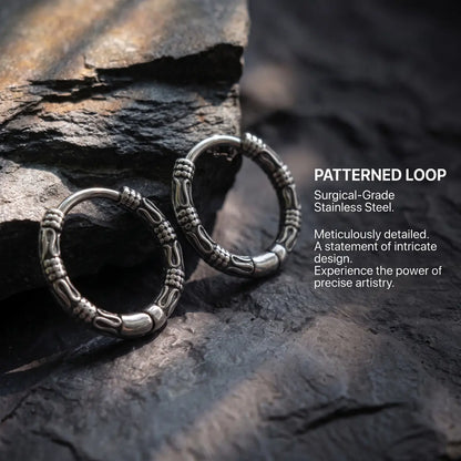 Bali Hoop Earrings Silver on Stone Surface