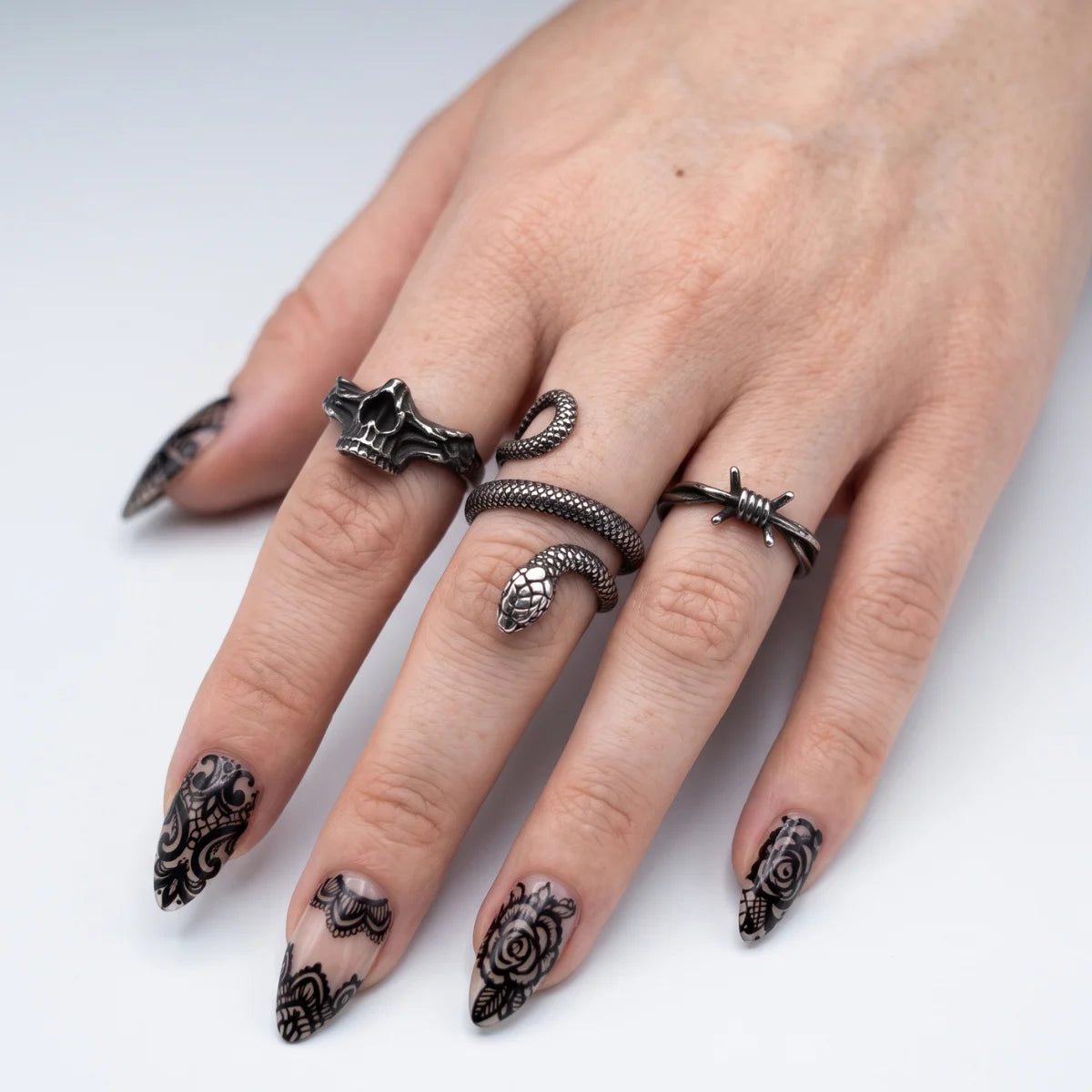 Barbed Wire Ring Silver Worn on Female Hand with Snake and Skull Rings