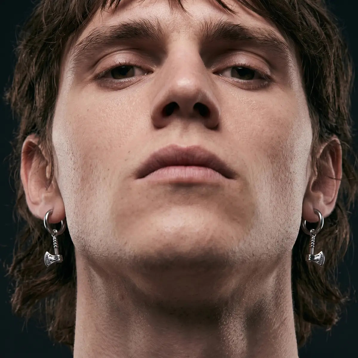 Battle Axe Earrings Silver Worn by Male Model Front View