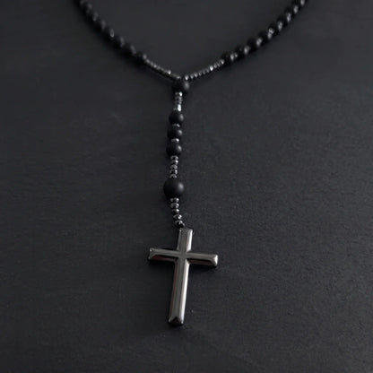 Black Beaded Cross Necklace Close Up Black Background