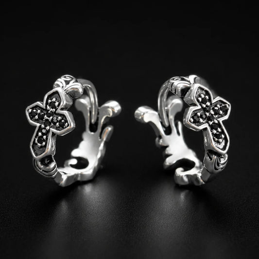 Black CZ Cross Huggie Hoop Earrings Silver Pair Close Up Black Background