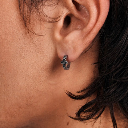 Black CZ Cross Huggie Hoop Earrings Silver Worn by Male Model Close Up
