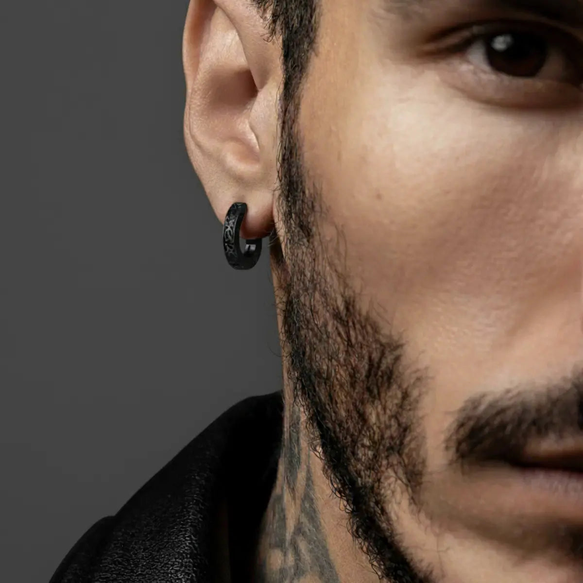 Black Celtic Knot Huggie Hoop Earrings Worn by Male Model