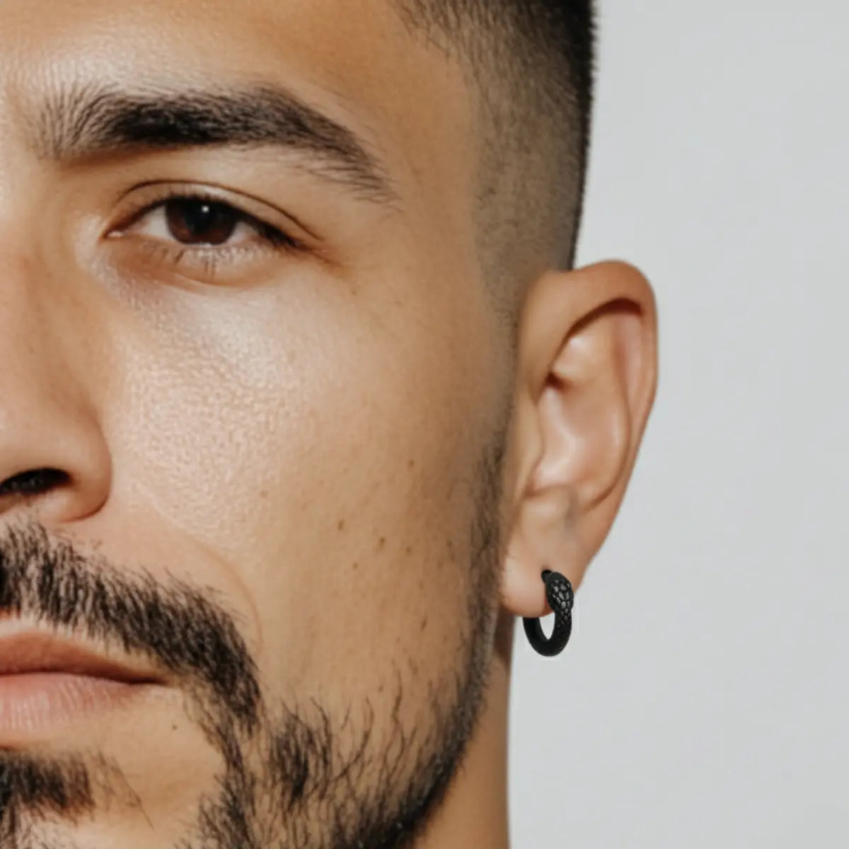 Black Double Snake Head Hoop Earrings Worn by Male Model