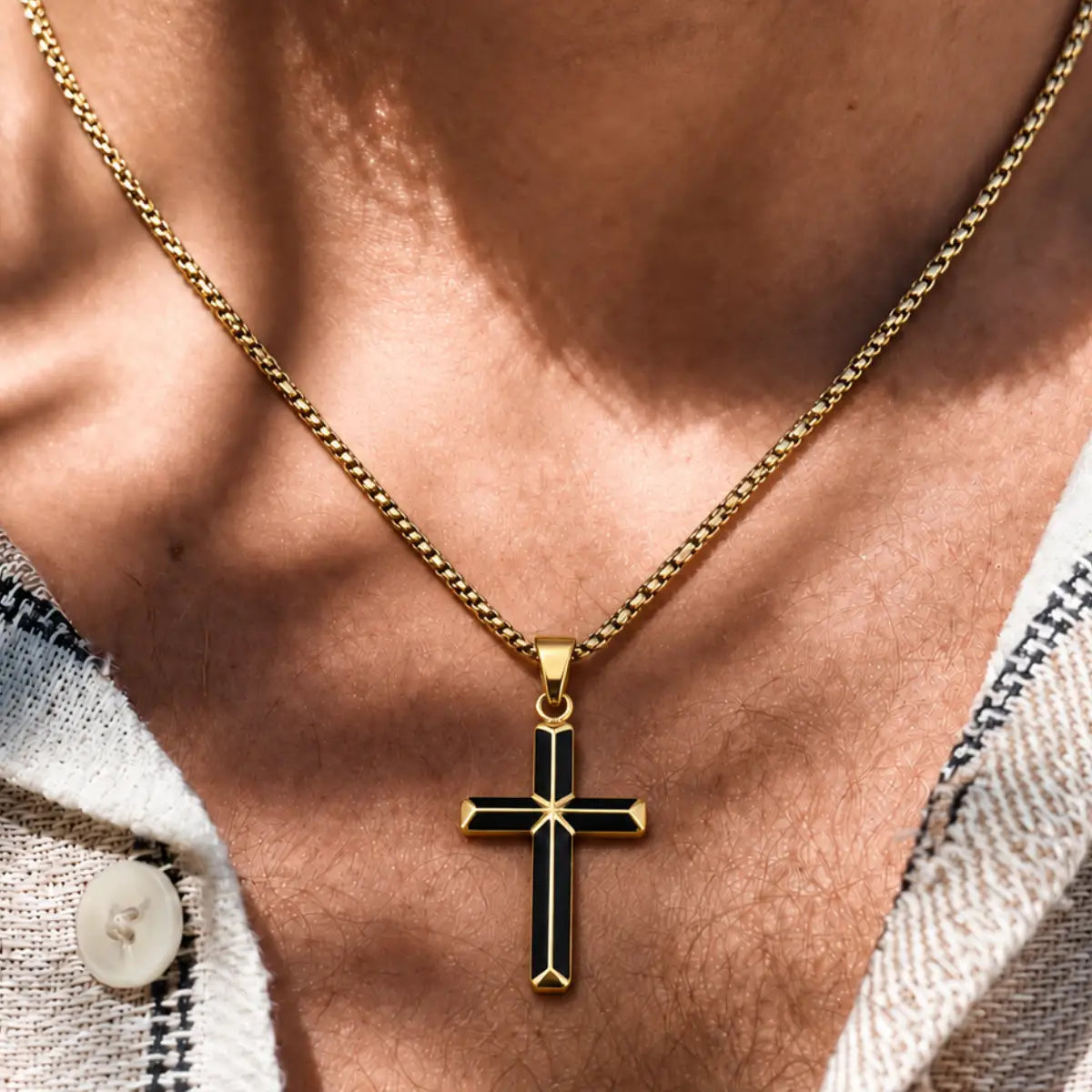 Black Enamel Cross Necklace Gold Worn by Male Model Chest View