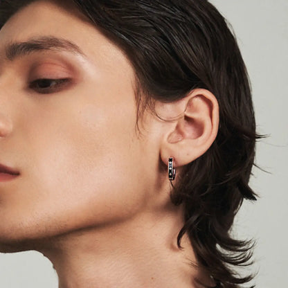 Black Enamel Star Silver Hoop Earrings Worn by Male Model