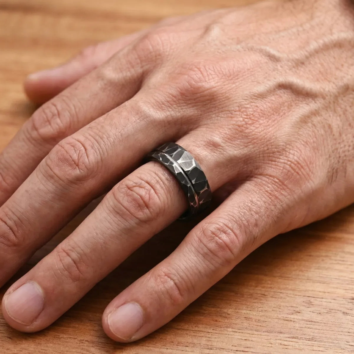 Black Hammered Tungsten Ring Worn by Male Model Details