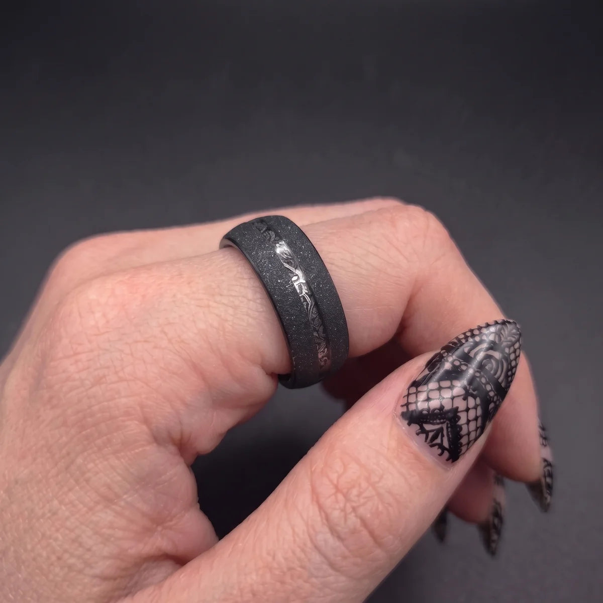 Black Meteorite Tungsten Ring Worn on Hand Close Up