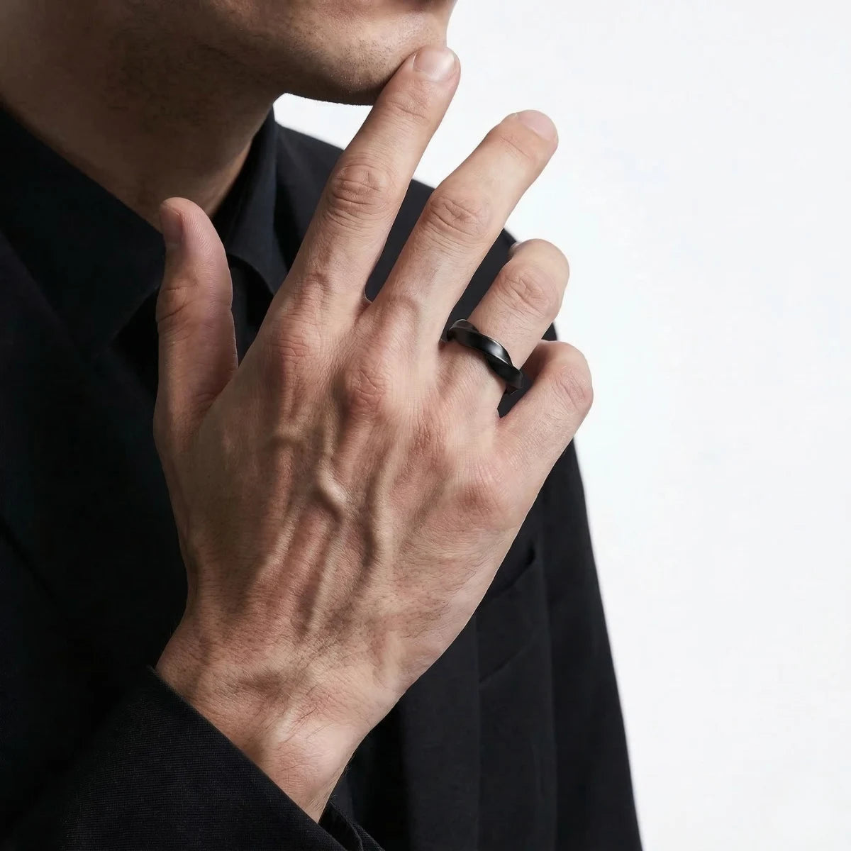 Black Mobius Strip Ring Worn by Male Model
