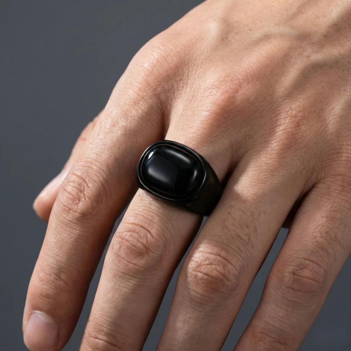 Black Ring with Black Stone Worn by Male Model Close Up
