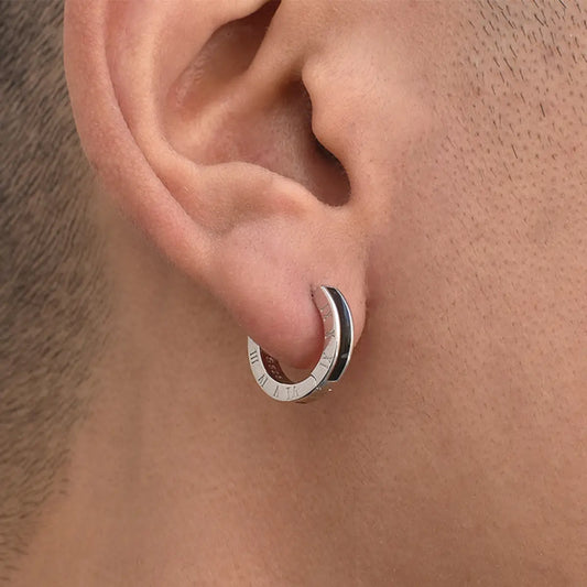 Black Roman Numeral Stud Earrings Worn by Male Model Close Up