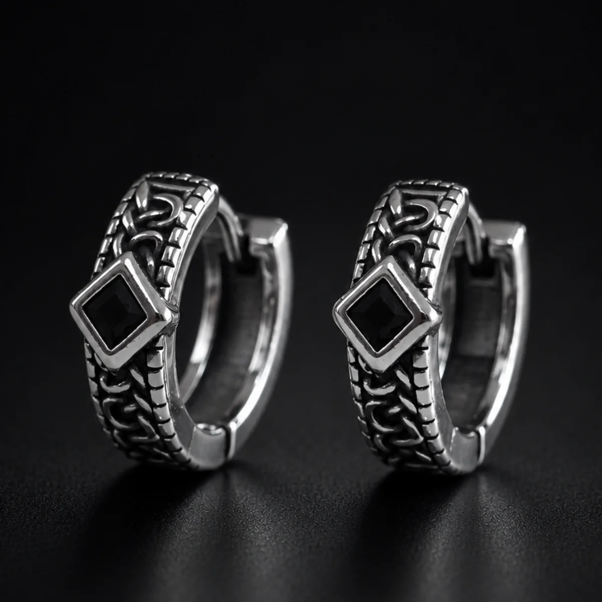 Black Stone Celtic Hoop Earrings Silver Pair Close Up Black Background
