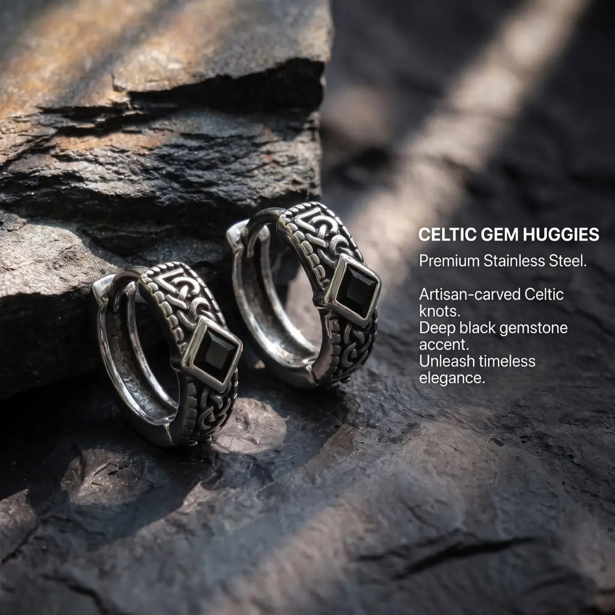 Black Stone Celtic Hoop Earrings Silver Pair Displayed on Stone Surface