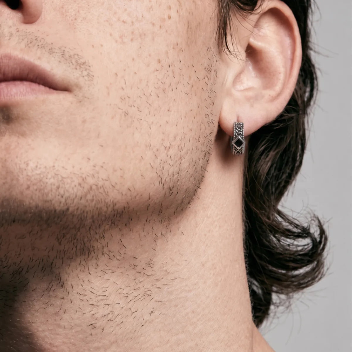 Black Stone Celtic Hoop Earrings Silver Side Profile Worn by Male Model