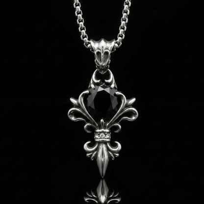 Black Stone Fleur De Lis Necklace Close Up Black Background