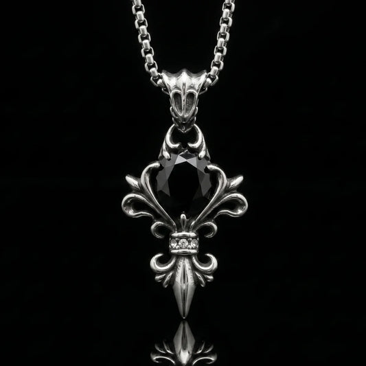 Black Stone Fleur De Lis Necklace Close Up Black Background