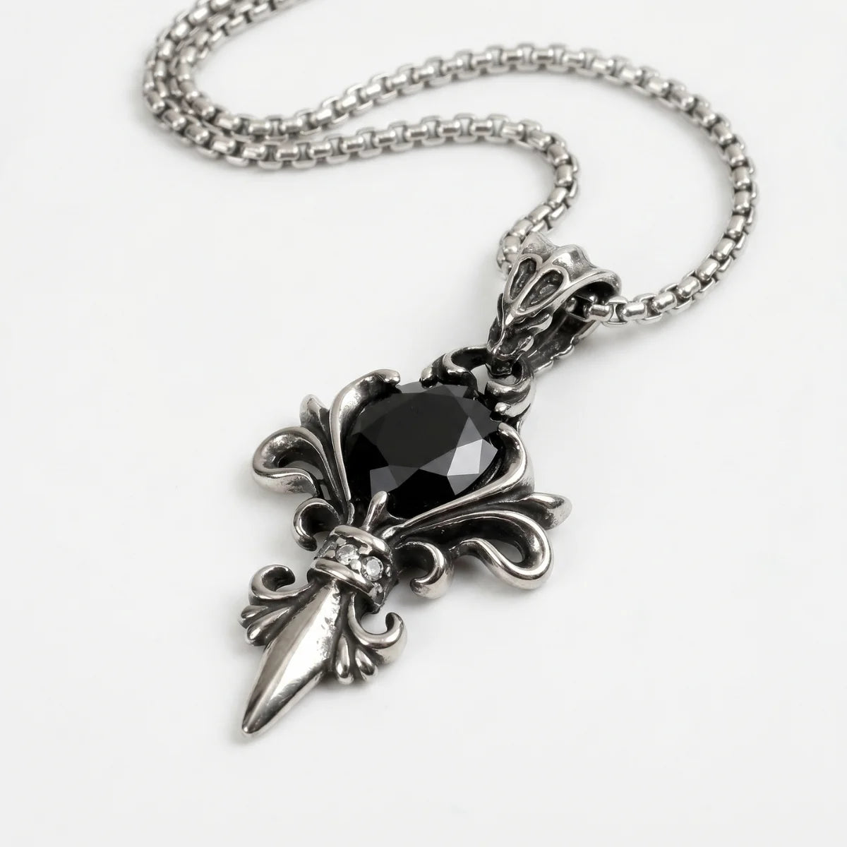 Black Stone Fleur De Lis Necklace Close Up