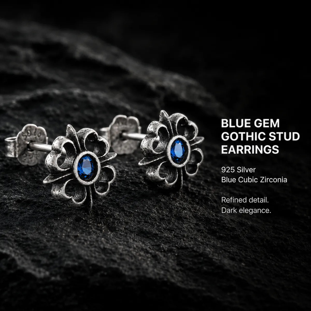 Blue Gem Gothic Stud Earrings 925 Silver Pair Displayed on Stone Surface