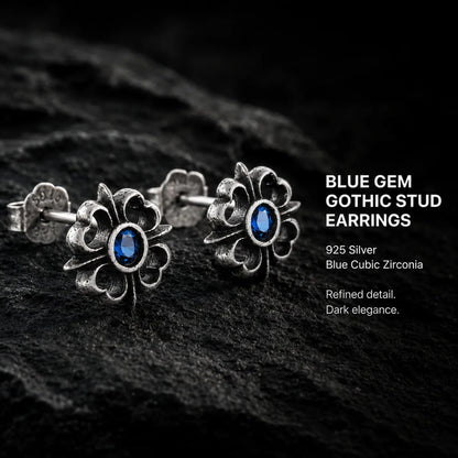 Blue Gem Gothic Stud Earrings 925 Silver Pair Displayed on Stone Surface