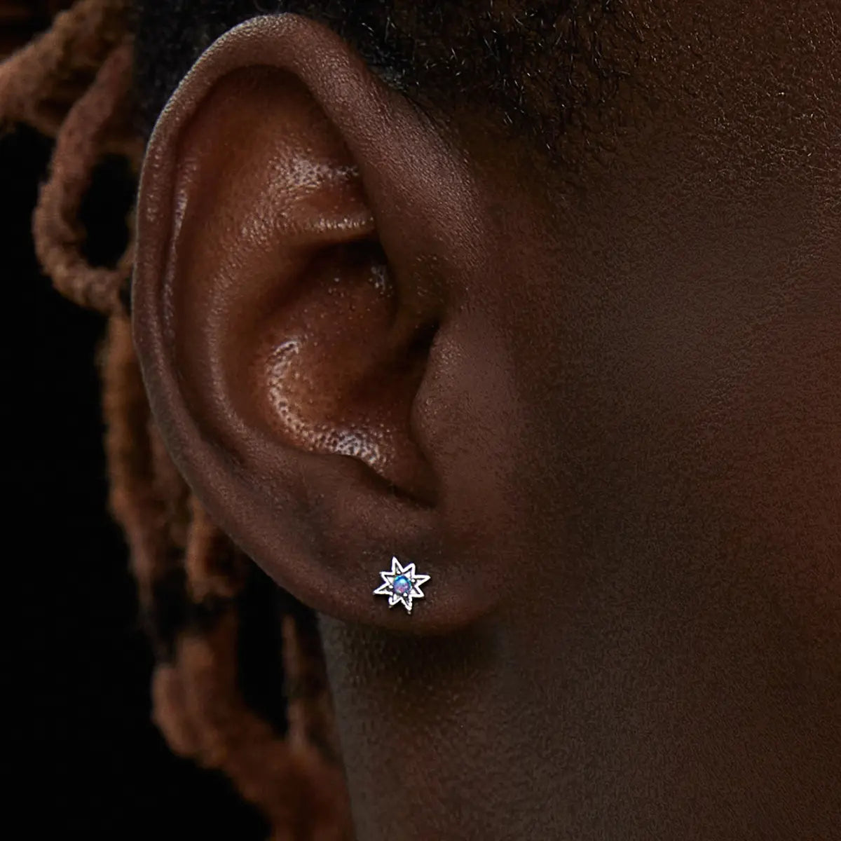 Blue Opal North Star Stud Earrings Sterling Silver Worn by Male Model Front View