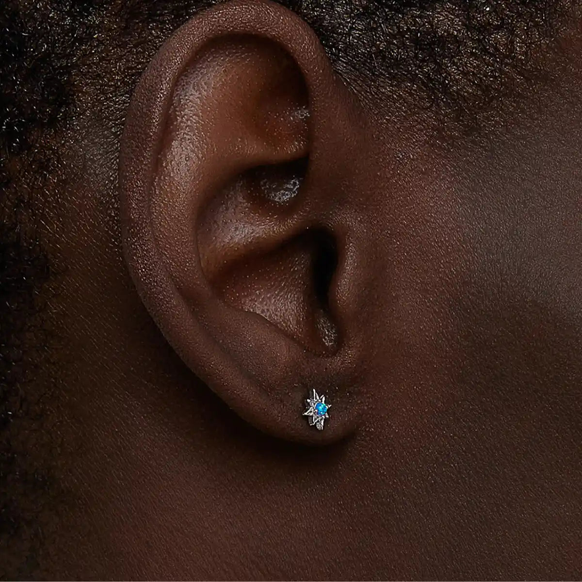 Blue Opal North Star Stud Earrings Sterling Silver Worn by Male Model Side View