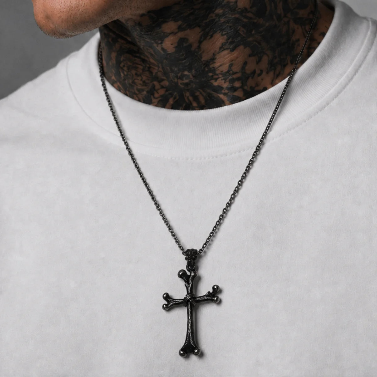 Bone Cross Necklace Antique Silver Worn by Male Model Chest View