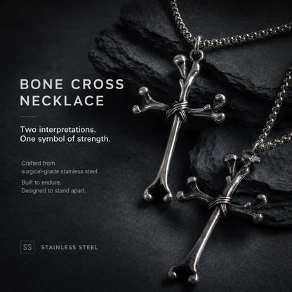 Bone Cross Necklace Silver Displayed on Stone Surface