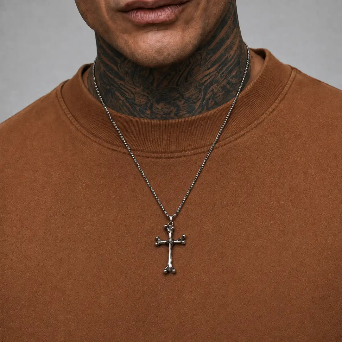 Bone Cross Necklace Silver Worn by Male Model Chest View