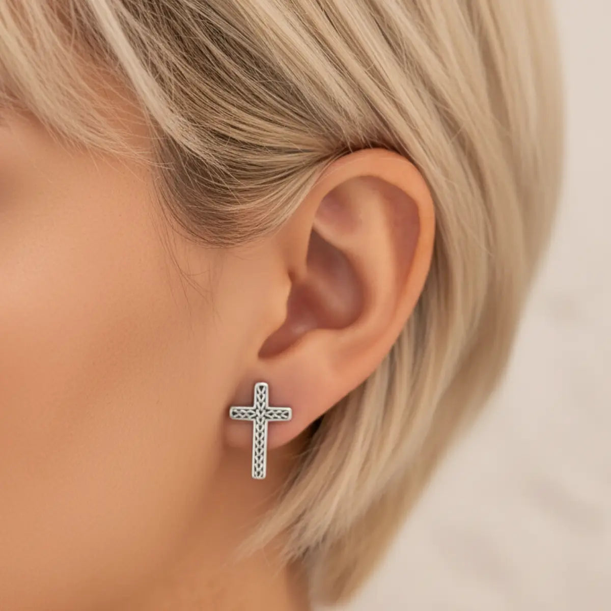 Braided Cross Stud Earrings Worn by Female Model