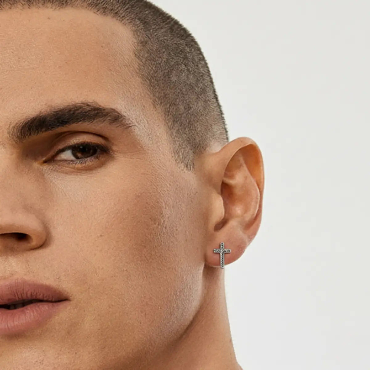 Braided Cross Stud Earrings Worn by Male Model