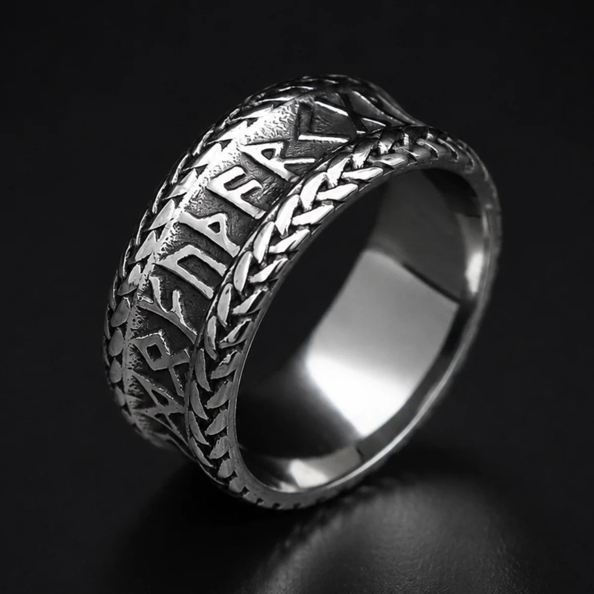Braided Edge Rune Ring Silver Close Up Black Background