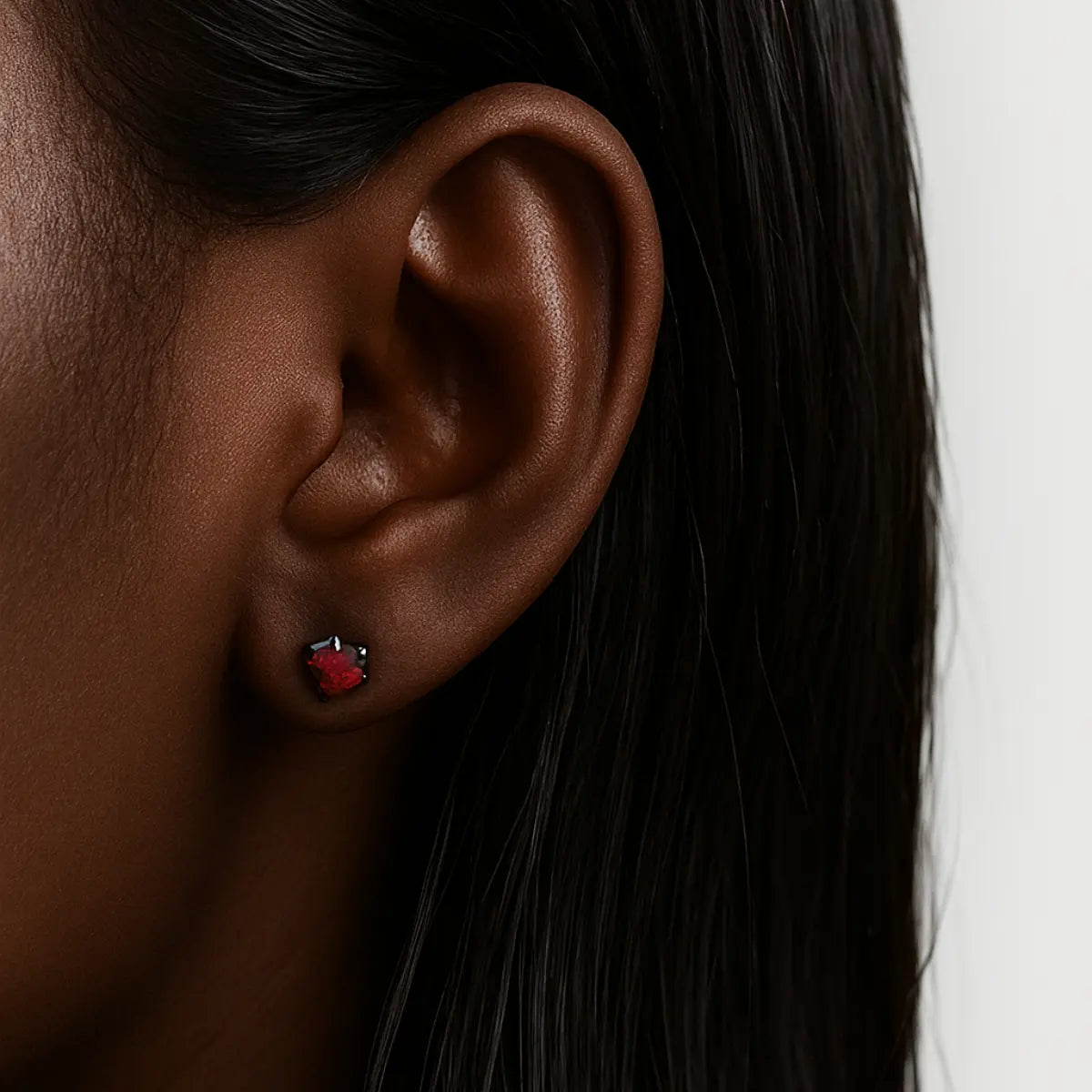 CZ Diamond Claw Stud Earrings Stainless Steel Worn by Female Model Close Up