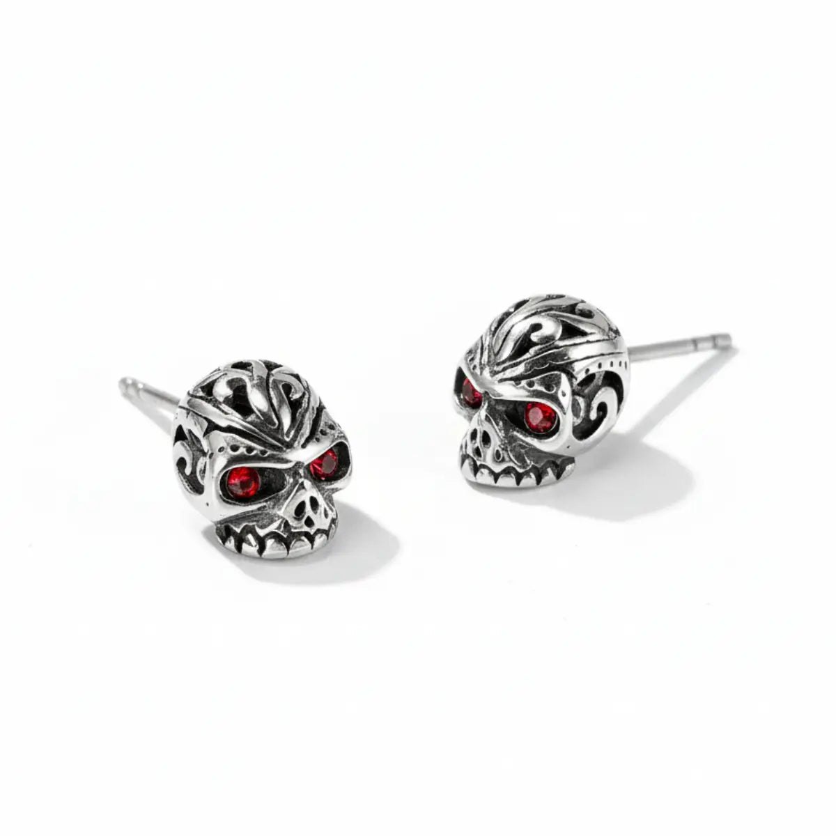 Carved Red Eye Skull Stud Earrings Front