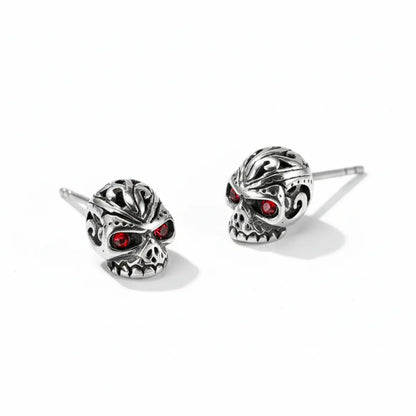 Carved Red Eye Skull Stud Earrings Front